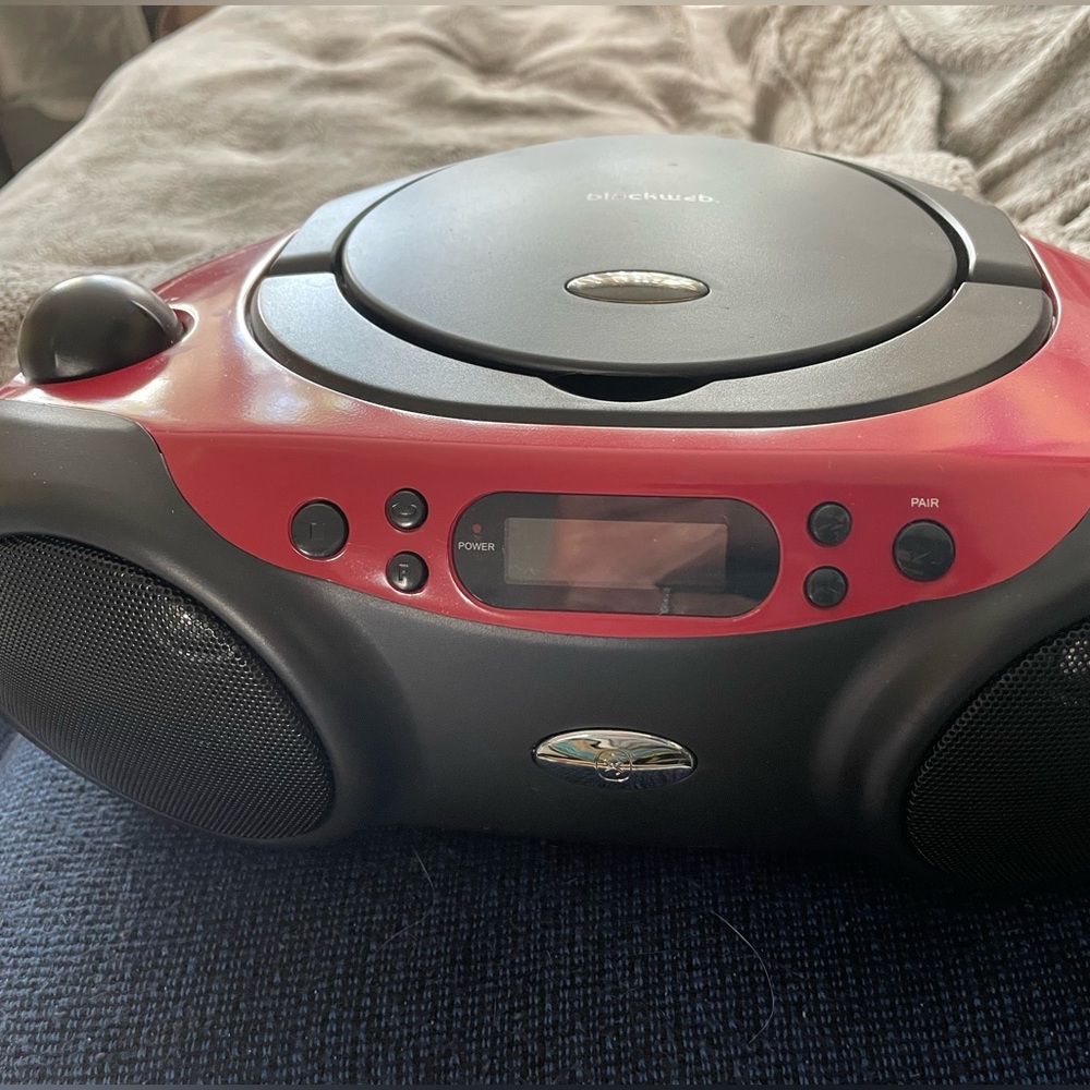 Black web CD player with radio